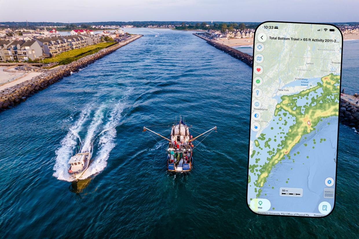 A screen capture showing an ocean map on a mobile phone superimposed over an aerial photo of two vessels passing each other through an inlet.